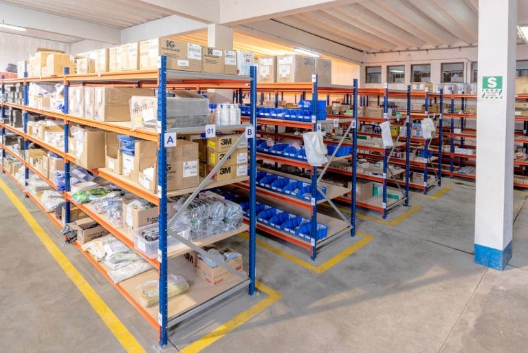 Blue and orange longspan shelving with stock